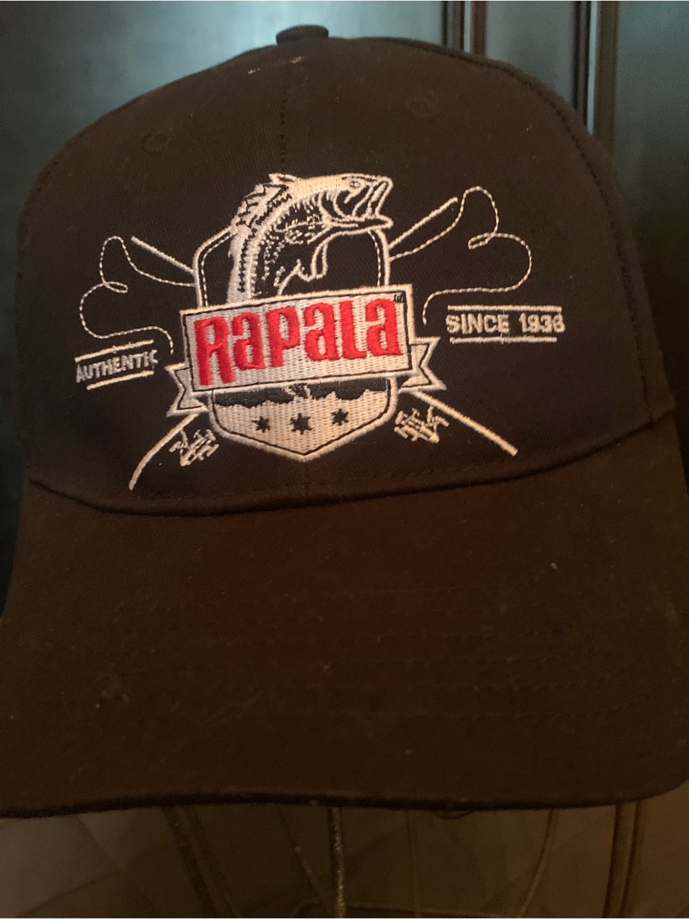 Rapala Lures Embroidered Fishing Logo Cap in Black with Red Accents